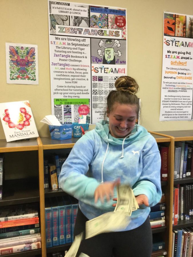 Junior%2C+Stormi+Ward+throwing+her+cash+prize+for+winning+Septembers+theme%3B+zentangle+designing.+
