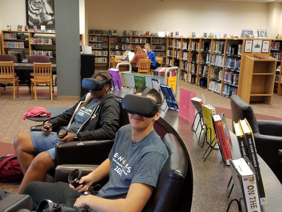 Mariah Stewart(12) and James Anderson(12) explore the VR headsets