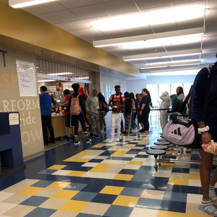 Students at HHS get their desired food in the cafeteria.