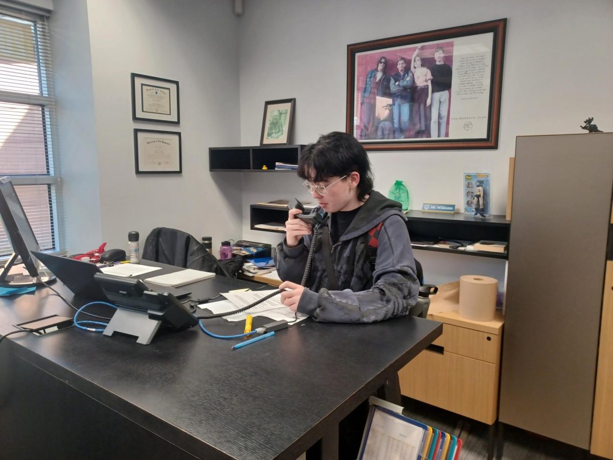 Senior Jess Gowan gives the announcements in Mr. David Williams Office on Thursday, October 9th.