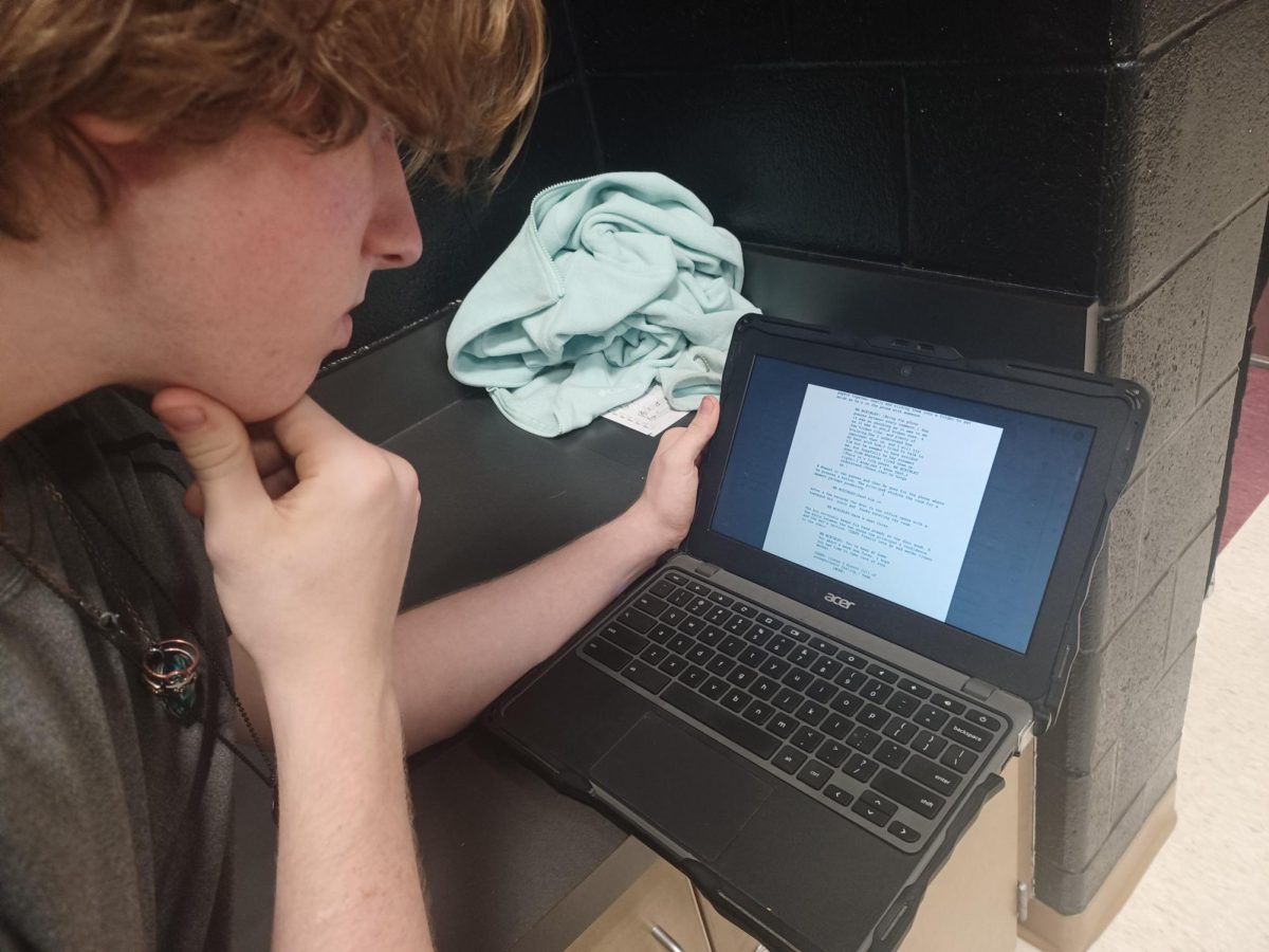 Senior Nick Urbanowicz works on his movie script after school, Monday, March 9th. 