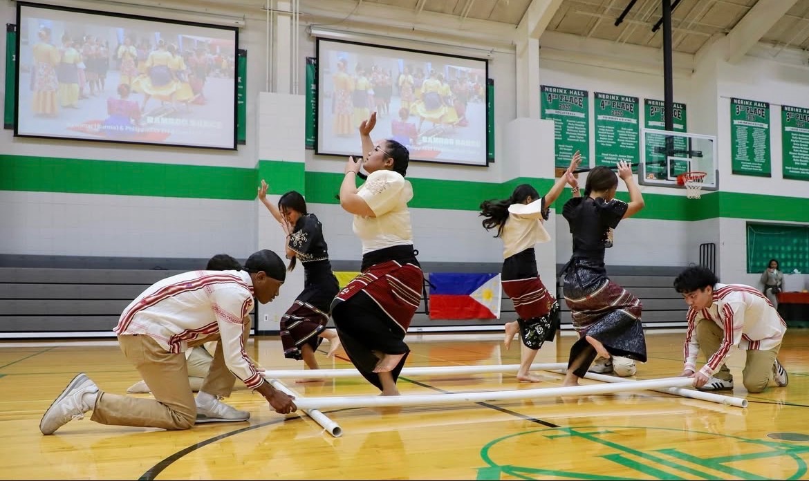 Performers execute Burmese folk dance at Netrex Hall.  