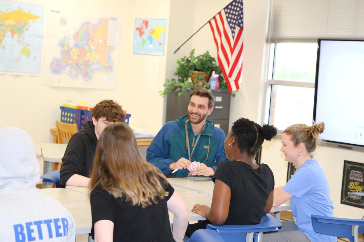 Mr Hasting's hosts a "Spoons" card game tournament for a prize of $10 in his class for Friday Fun Day. 