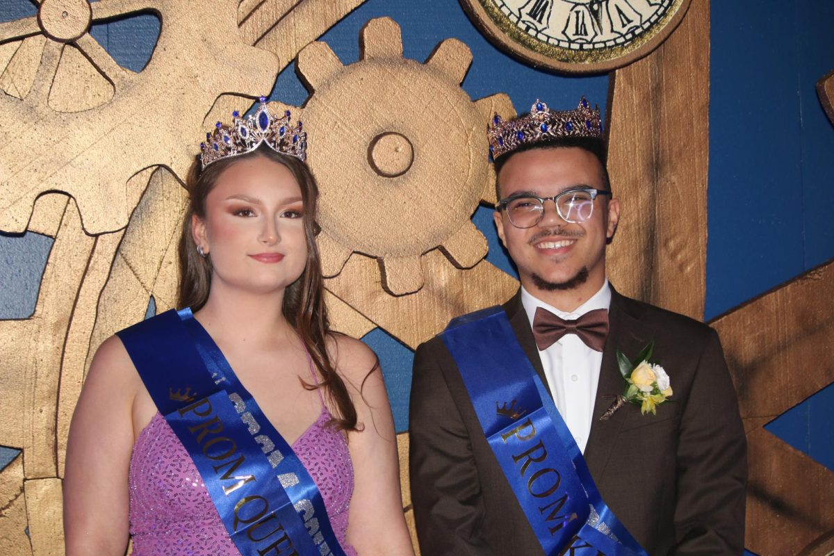 Crowley and Harvey moments after winning prom king and queen. 